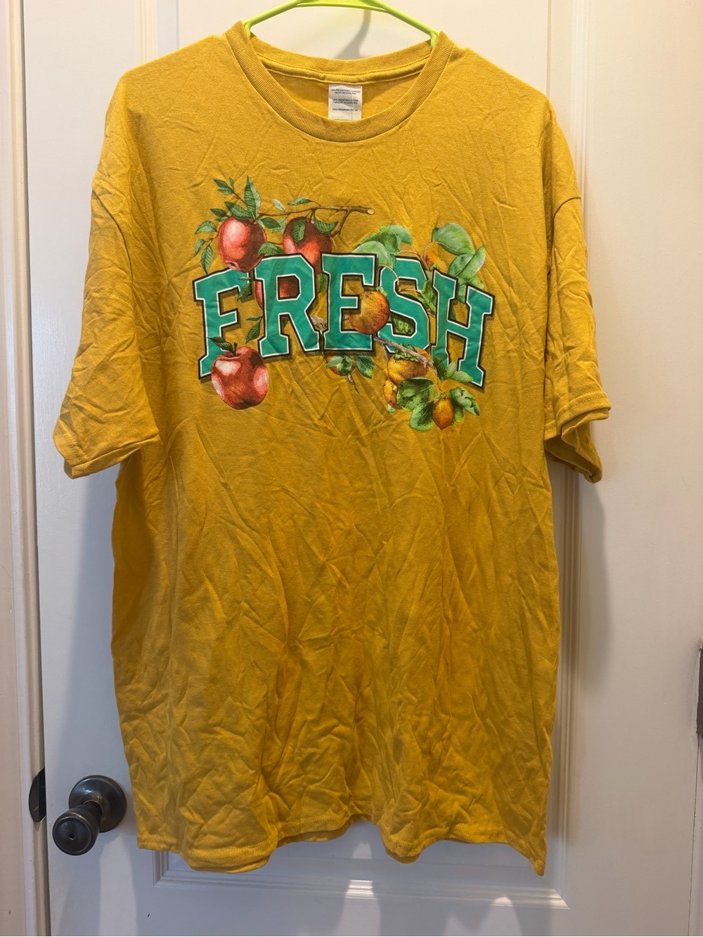 fresh Mustard Yellow Short-Sleeve Tee with Teal Block Lettering and Fruit Motif